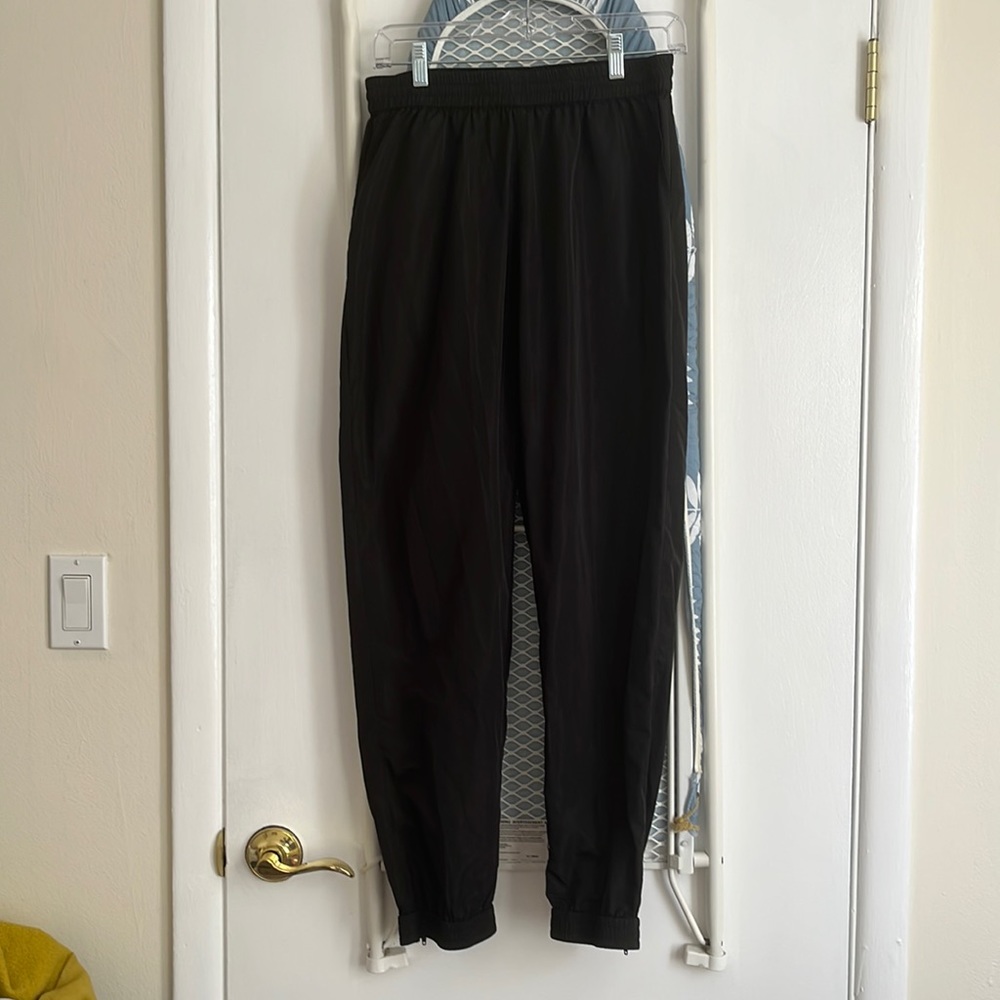 Adika swishy joggers with ankle zip